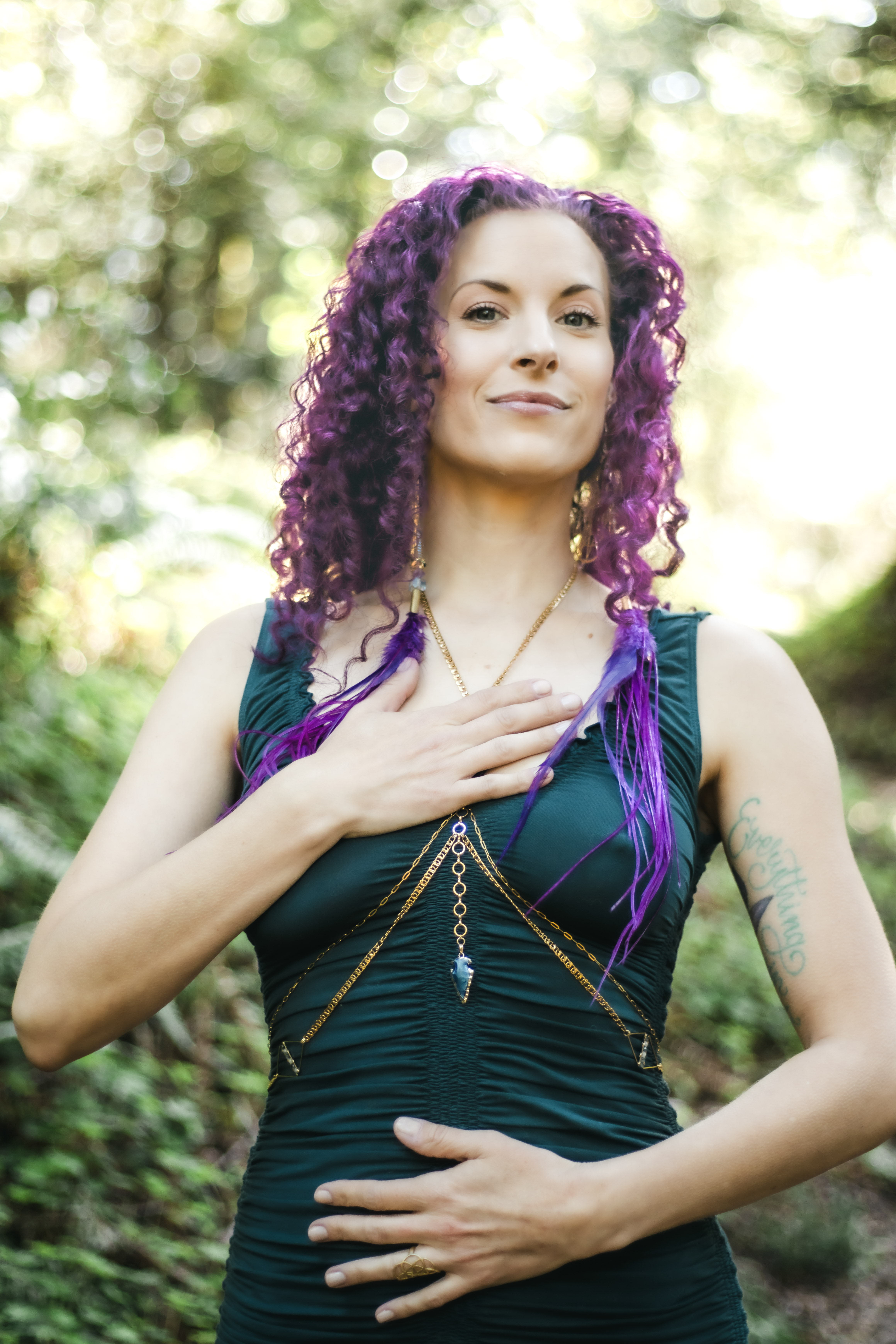 Astra Fox with her hands over her heart